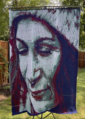 7foot knit tapestry of a face looking down