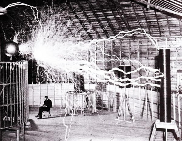 Nikola Tesla in his Laboratory (ca. 1899)

A double-exposed photograph showing Tesla in his Colorado Springs laboratory, ca. 1899. Tesla forced his “magnifying transmitter” to produce inefficient arcs by turning the machine rapidly on and off during the photoshoot for The Century Magazine