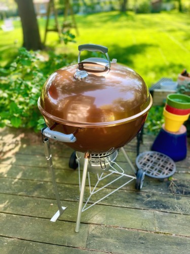 Copper Weber kettle grill. 