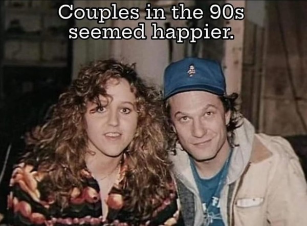 Text says:
Couples in the 90s seemed happier.

Picture is of the actress that played Catherine Martin and the actor that played James Gumb in the Silence of the Lambs movie posing together, smiling