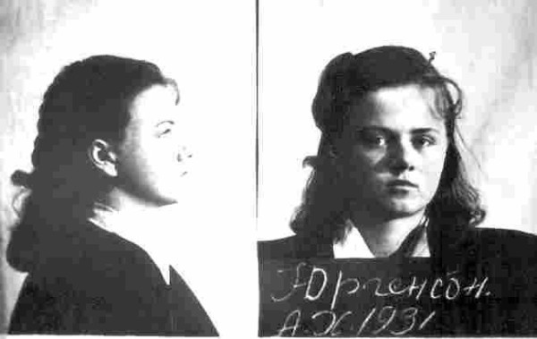 Police mugshots of Aili Jürgenson after her arrest. She is a white woman with dark hair.