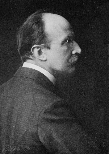 Planck in 1918, the year he was awarded the Nobel Prize in Physics for his work on quantum theory
AB Lagrelius & Westphal. The American Institute of Physics also credits the photo to AB Lagrelius & Westphal, which is the Swedish company used by the Nobel Foundation for most photos of its book series Les Prix Nobel.

A vintage black and white photo of Max Planck wearing a suit with a visible ear, hair parting, and collar from a profile view. There is a signature at the bottom right corner in cursive text.