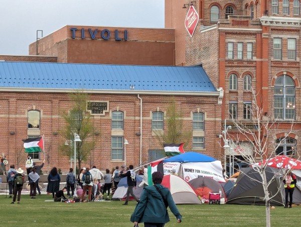 Protesters camped out on the Auraria quad in front of the Tivoli Center. Palestinian flags are flying nearby