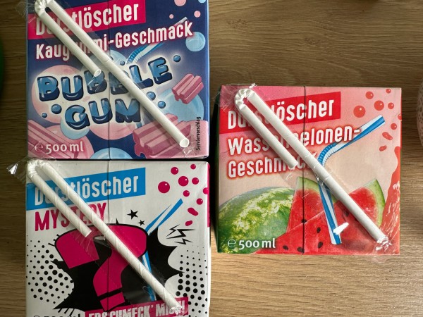 Three packs of Durstlöscher with watermelon flavor, bubble gum flavor, and mystery flavor.