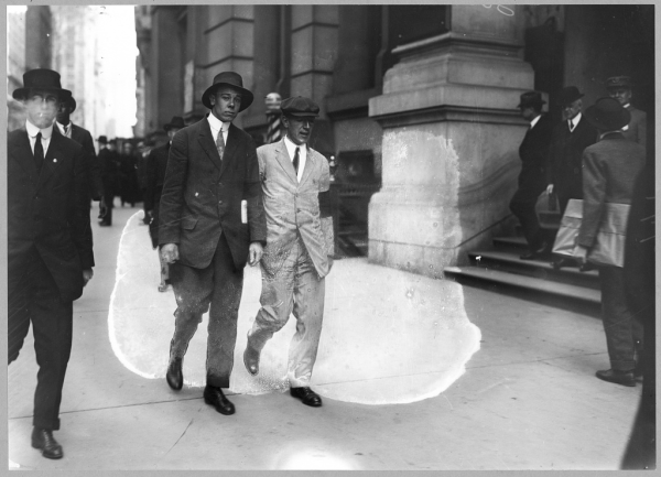  Title: [Author Upton Sinclair, in white suit with black arm band, picketing Rockefeller Building]
Date Created/Published: [1914 May]
Medium: 1 photographic print : gelatin silver.
Reproduction Number: LC-B2-3061-2 (b&w glass neg.)
Rights Advisory: No known restrictions on publication.
Call Number: LOT 10876-4 <item> [P&P]
Repository: Library of Congress Prints and Photographs Division Washington, D.C. 20540 USA

Notes:
    George Grantham Bain Collection (Library of Congress).

