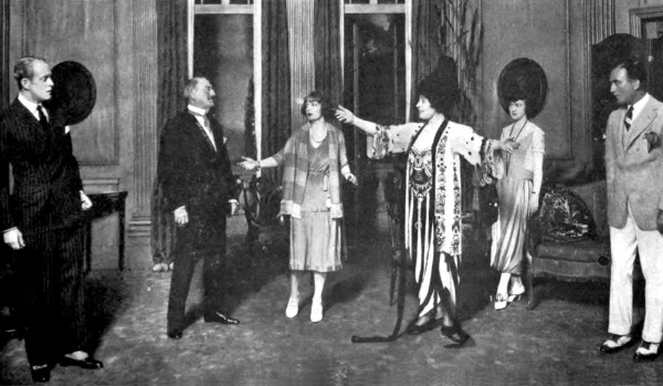 Black and white photo of the 1921 Broadway cast of The Circle, L-R: Robert Rendel, John Drew, Estelle Winwood, Mrs. Leslie Carter, Maxine MacDonald, and John Halliday