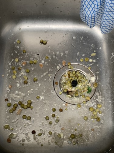 Sink blocked with food. 