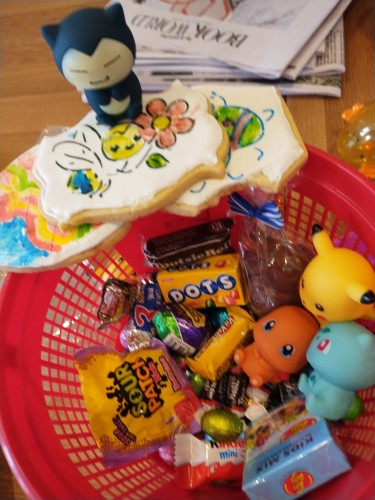 Easter egg basket with candy and pokemon