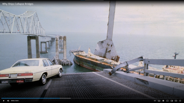 1970s car with one wheel dangling off the end of a collapsed bridge