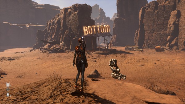 Screenshot from the game, the main character is standing in a canyon, and a huge neon sign says “bottom”