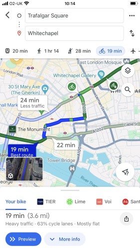 Screenshot of Google maps showing a bike journey from Trafalgar Square to Whitechapel, and the roads are colour marked blue for no bike Lane then light and dark green for marked/segregated lanes