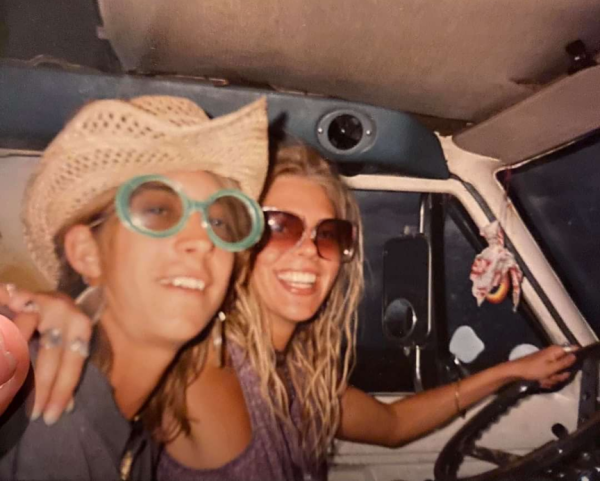 Two hippies in an old Econoline van back in the nineties