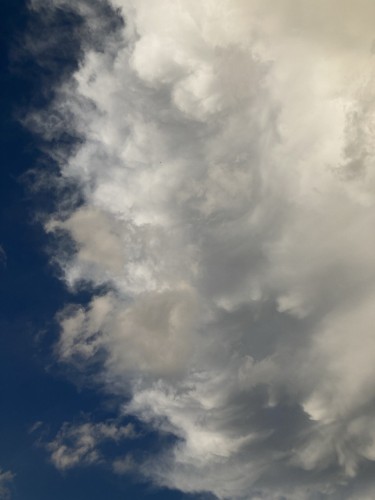 Photograph of clouds. Part of Cumulonimbus. Thunder could be heard in the background. 
