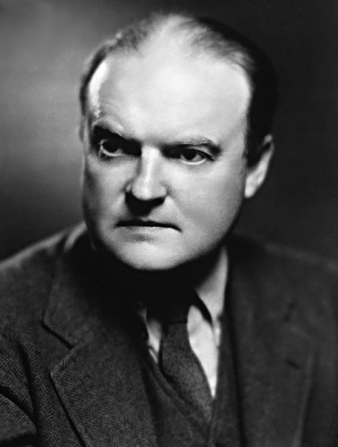 Publicity photograph of literary critic and writer Edmund Wilson (1895-1972) taken at 52 W. 52nd Street in New York City by studio portraitist Ben Pinchot circa April 1936. As Wilson paid Pinchot for this publicity photograph, the copyright wholly resided with Wilson. The author distributed this publicity photograph to promote his upcoming 1936 book Travels in Two Democracies published by Harcourt, Brace & Company. According to archivists at the U.S. Library of Congress and the New York Public Library, Wilson's publicist Dorothy Larrimore of Doubleday & Company again freely released and distributed this publicity photograph without a copyright notice and with no use restrictions ten years later to promote the author's 1946 book Memoirs of Hecate County.