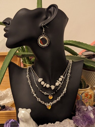 Layered white set with glass round golden earrings, 3 handmade beaded necklaces with white gemstones, hematite styled beads and yellowish golden heart pendants