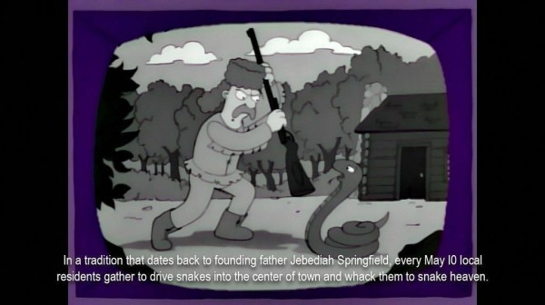 A cartoon image showing a black and white TV screen. On it, a man in a raccoon-skin hat is raising a gun to butt it against a snake, which is rearing back. The subtitle reads, "In a tradition that dates back to founding father Jebediah Springfield, every May 10 local residents gather to drive snakes into the center of town and whack them to snake heaven."