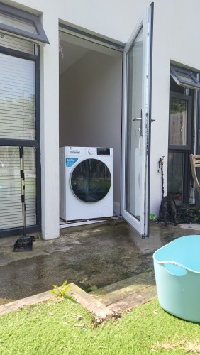A washing machine just inside the exterior door to my house