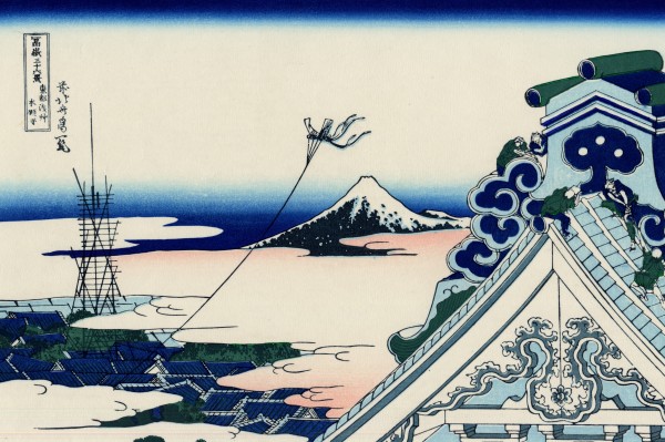 Woodblock print of a temple roof with a single kite and cloud-covered Edo below, with Mt Fuji in the background