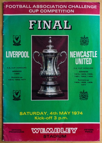 The front cover of the 1974 FA Cup final programme. It is mostly green when red stripes at the top and bottom. The FA Cup is in the middle with the word FINAL above, and the names and crests of Liverpool and Newcastle United to either side. The date of Saturday 4th May 1974 is below the cup and Wembley Stadium is named at the bottom.