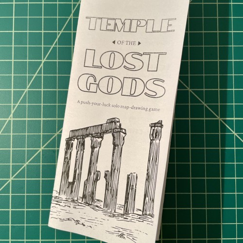 A trifold pamphlet reading TEMPLE OF THE LOST GODS: A push-your-luck solo map-drawing game