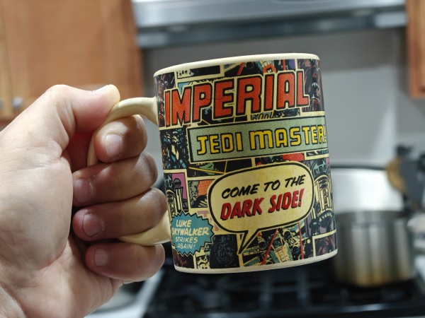 STAR WARS coffee mug made up of old comic book panels, with bubbles saying "imperial" 
"Jedi master"
"Come to the dark side"
"Skywalker strikes again"