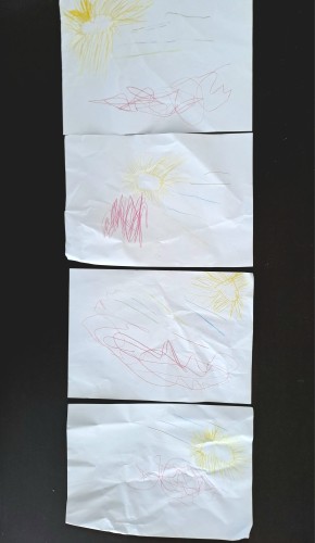 4 very similar kids drawings of a sun, a rainbow and a red blob that should symbolise a heart.