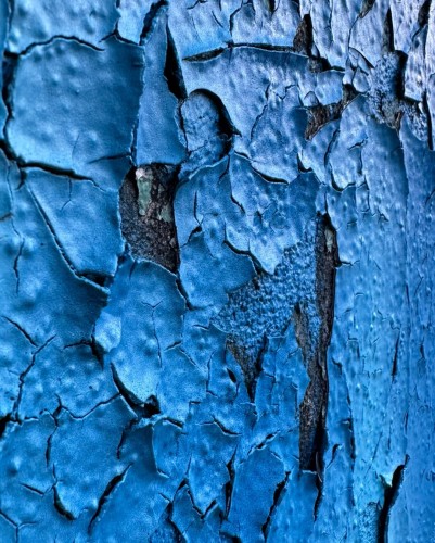 Blue paint cracking