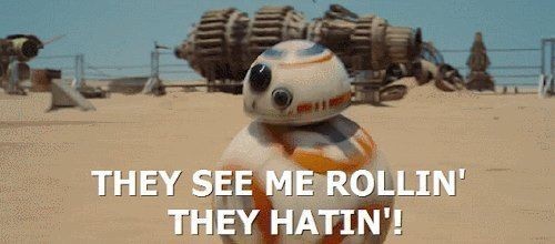 still from the movie The Force Awakens showing BB8 with text They see me rollin' they hatin'