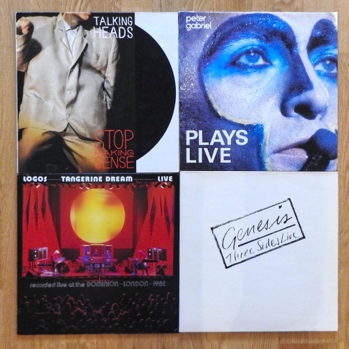 4 live albums on the floor: Talking Heads - Stop Making Sense; Peter Gabriel - Plays Live; Tangerine Dream - Logos; Genesis - Three Sides Live