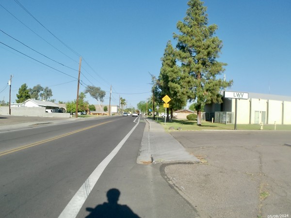 Street view facing westbound on Maryland just west of 27th Ave.