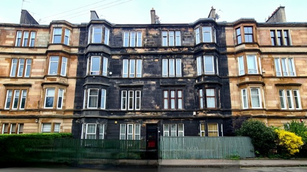 Cleaned and uncleaned Glasgow tenements.