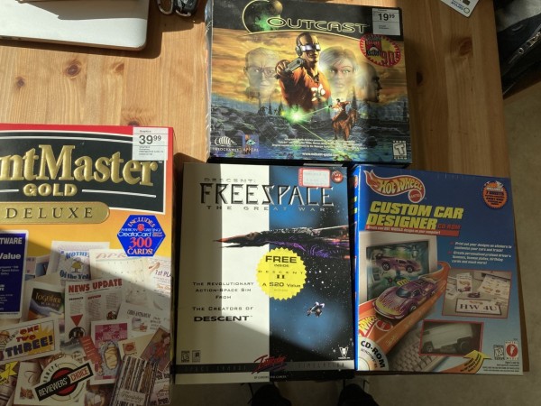Three games:
Outcast
Hot Wheels Custom Car Designer
Descent: Freespace

and
Printmaster Gold Deluxe