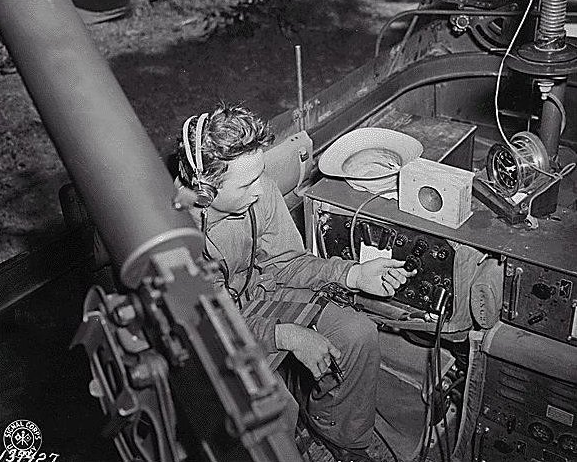 WWII photo showing similar radio in what might be a tank or?