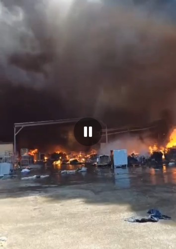 screen capture of video showing massive fire at military storage facility in Israel
