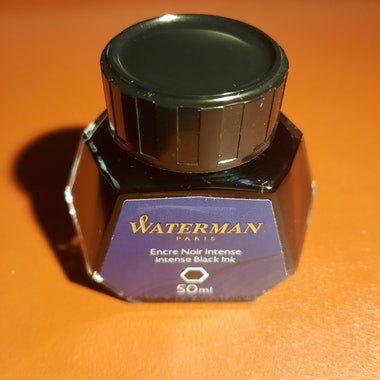 Bottle of fountain pen ink labeled "Waterman Paris - Intense Black Ink - 50ml"