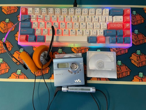 MiniDisc Player and Disc, Mechanical Keyboard, and Headphones