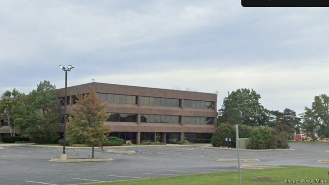 An office building in an empty parking lot