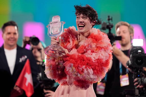 Nemo with Eurovision trophy
