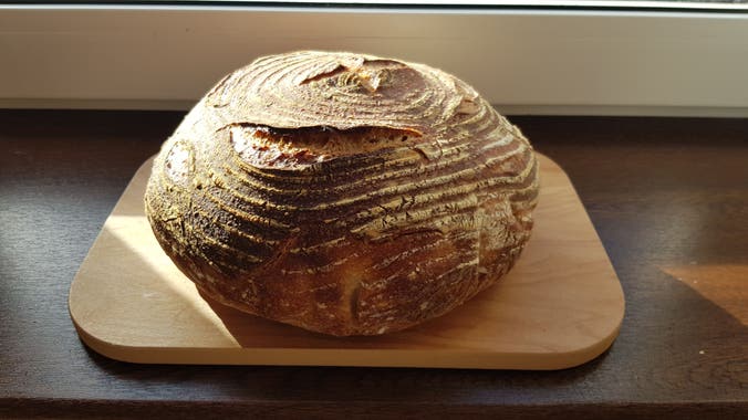 I followed this recipe, but I also added a teaspoon of brown sugar: https://www.jamieoliver.com/recipes/bread-recipes/sourdough-bread-recipe/