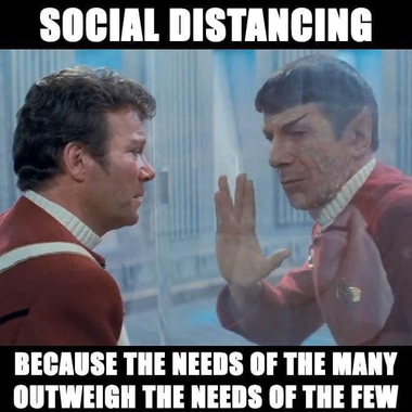 An image of Spock walled off inside a radiation chamber while Kirk looks on helplessly from the outside. Text: "Social distancing, because the needs of the many outweigh the needs of the few".