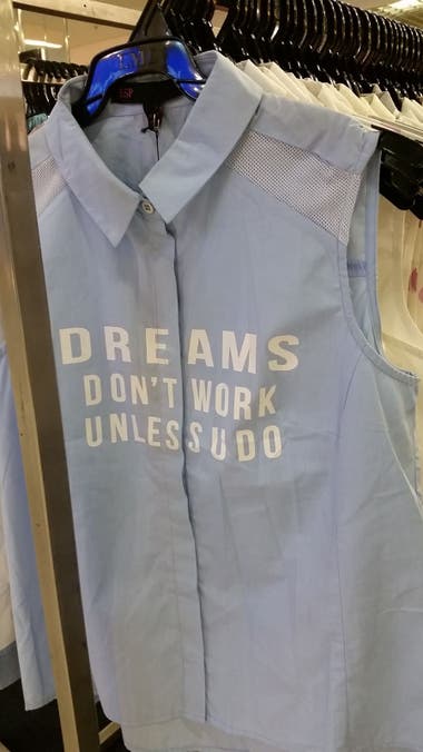 A shirt with text: "DREAMS DON'T WORK UNLES SUDO"