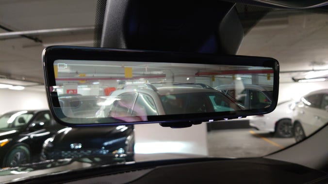 A rear view mirror but a tiny camera icon is visible in the upper left