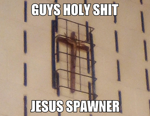 Metal cage with a religious cross inside.

Top caption: GUYS HOLY SHIT

Bottom caption: JESUS SPAWNER