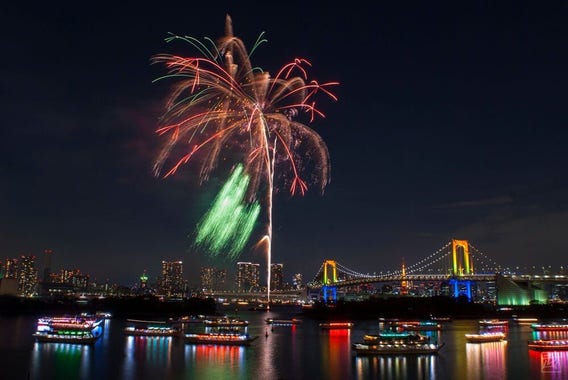 Fireworks over Tokyo Tower, Rainbow Bridge, and yakatabune