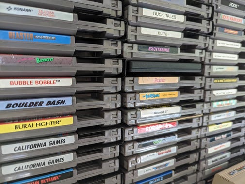 A shelf of NES games that I'll honestly never play.