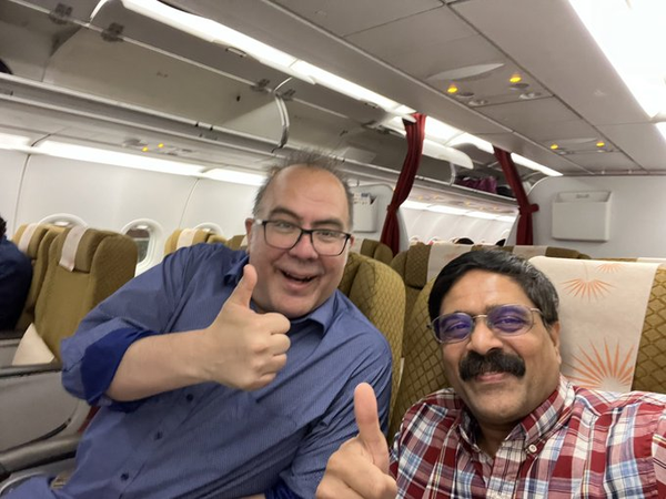 Airplane photo with me, Daniel Hinojosa, with programmer celebrity and author Venkat Subramaniam
