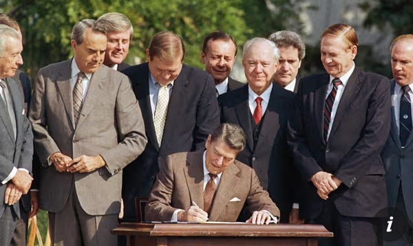 group of old white men in suits happy about a piece of paper being signed