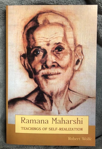 Book cover of “Ramana Maharshi — Teachings of Self-Realization” by Robert Wolfe. It features a sepia-toned drawing of Ramana’s head and neck. He is looking at the viewer with a slight smile. 