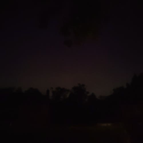 blurry picture of a pinky orange sky