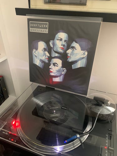 Kraftwerk's album "Techno Pop" playing on my record player.